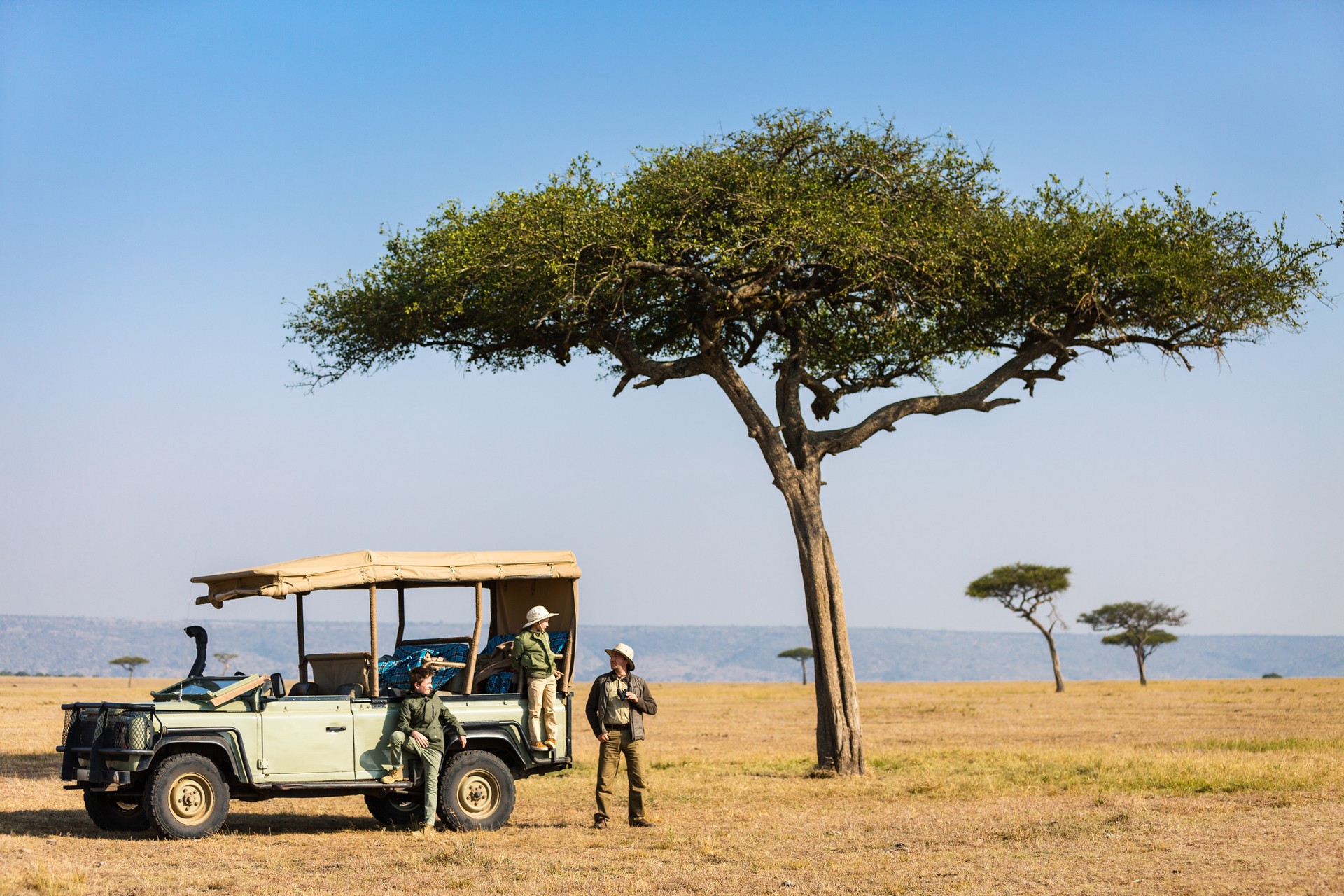 Where to go on safari: Family with kids on a game drive in Kenya's Amboseli National Park