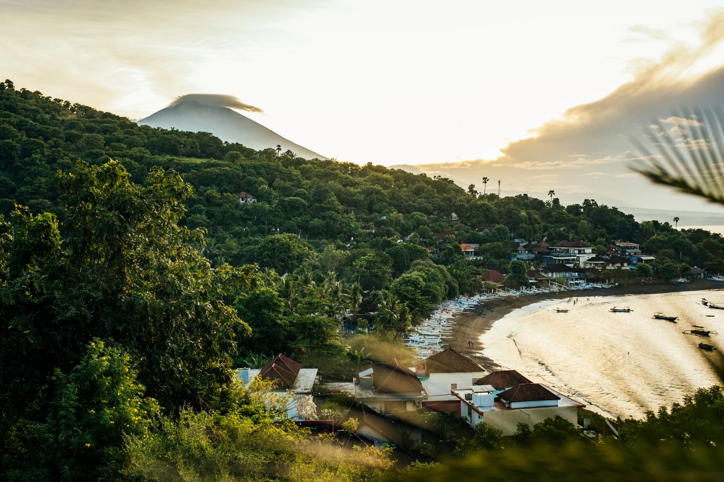 Coastal landscape of Amed beach in Bali at sunset