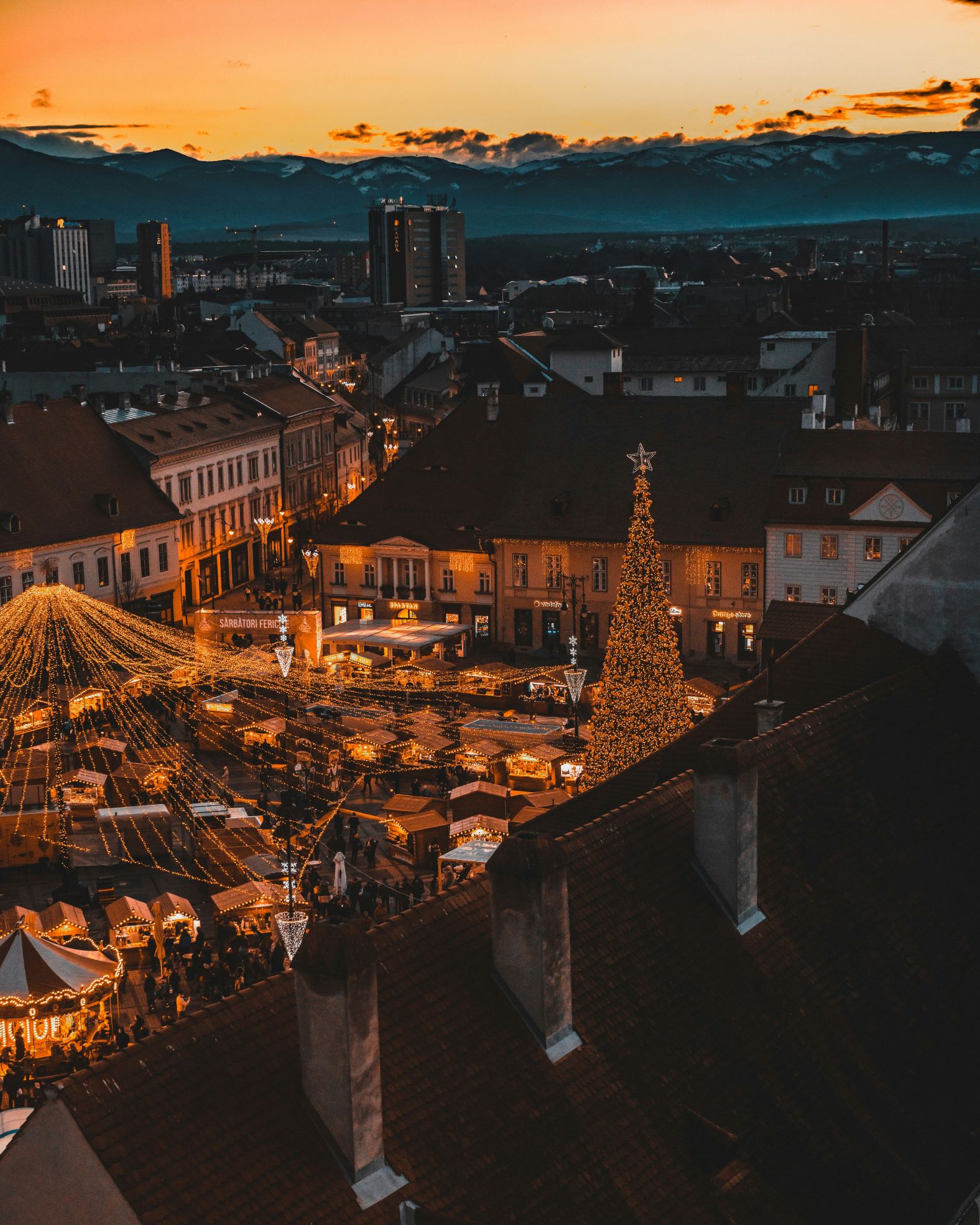 Christmas market scene at night in Sibiu, Romania