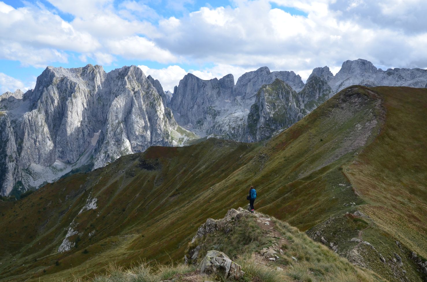 Things to do in Albania: a person hiking in the Accursed Mountains