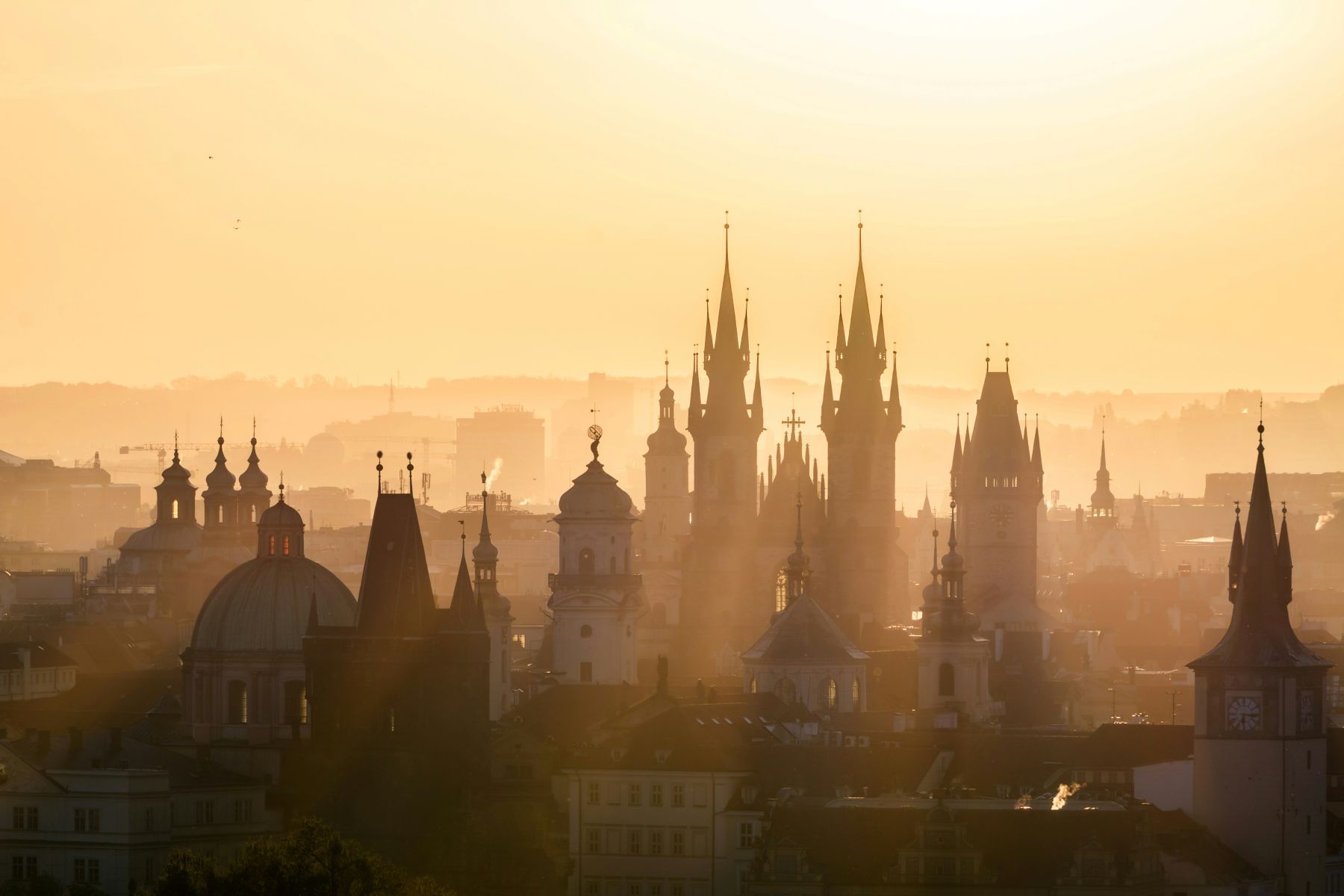 Hazy Prague skyline at sunset