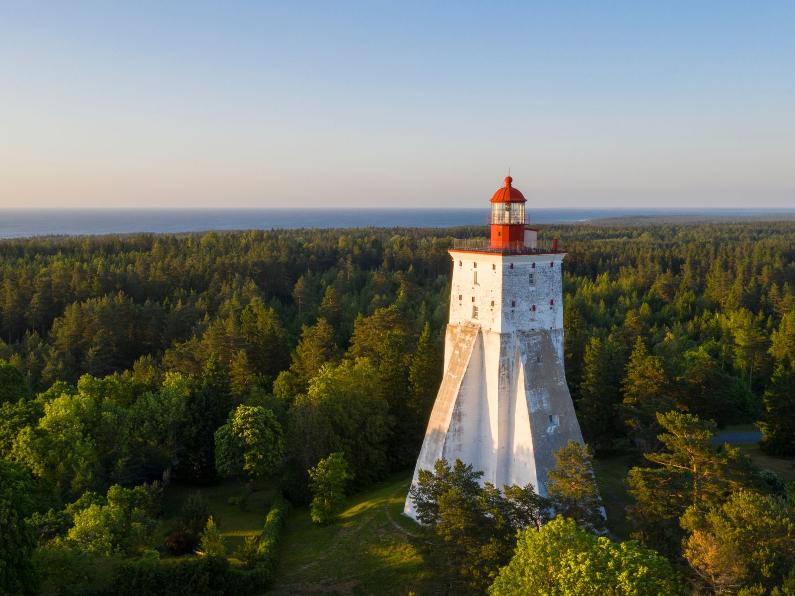 Top things to do in Estonia: visit Kopu lighthouse surrounded by a forest on Hiiumaa island