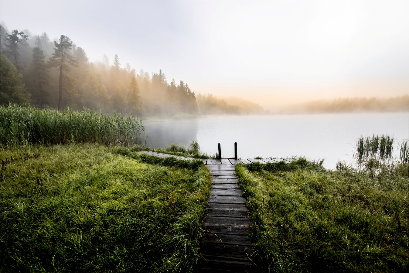 Switzerland travel tips: walking around Lake Staz on a misty day near St Moritz