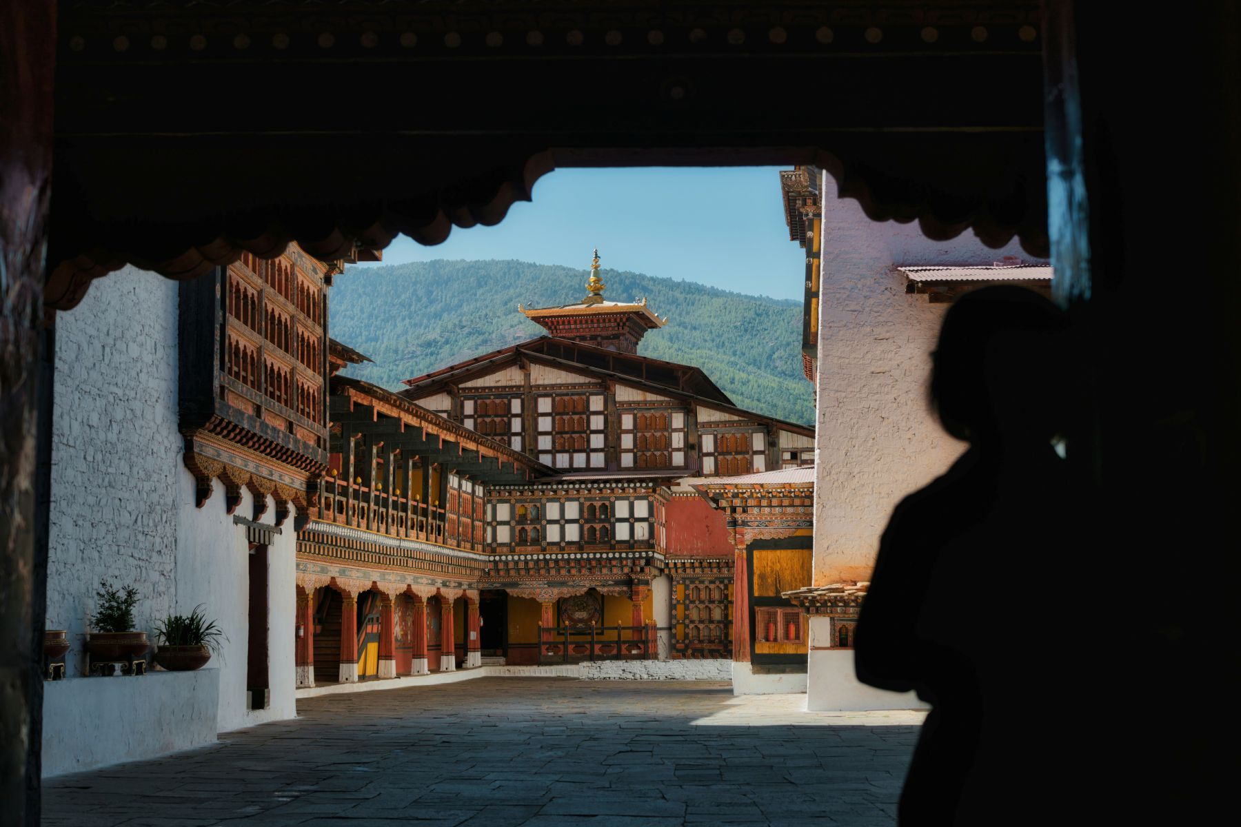 A quiet monastery courtyard; exploring the culture of Bhutan steeped in Buddhist traditions