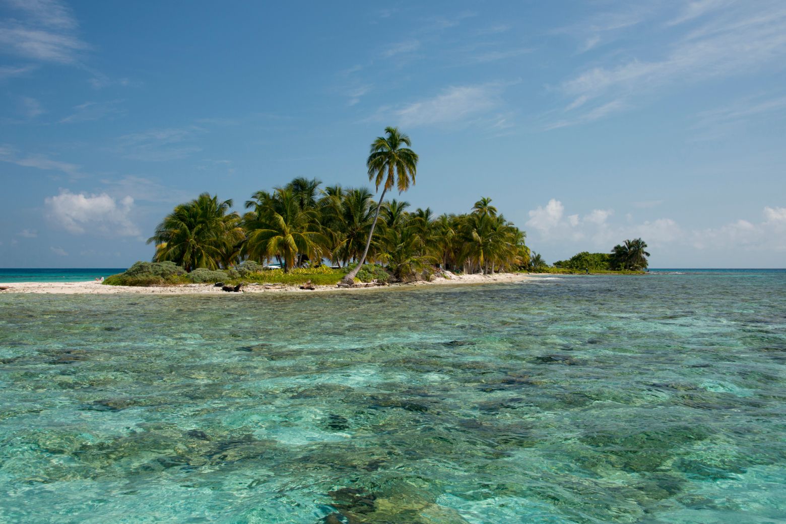 Laughing Bird Caye surrounded by pristine waters