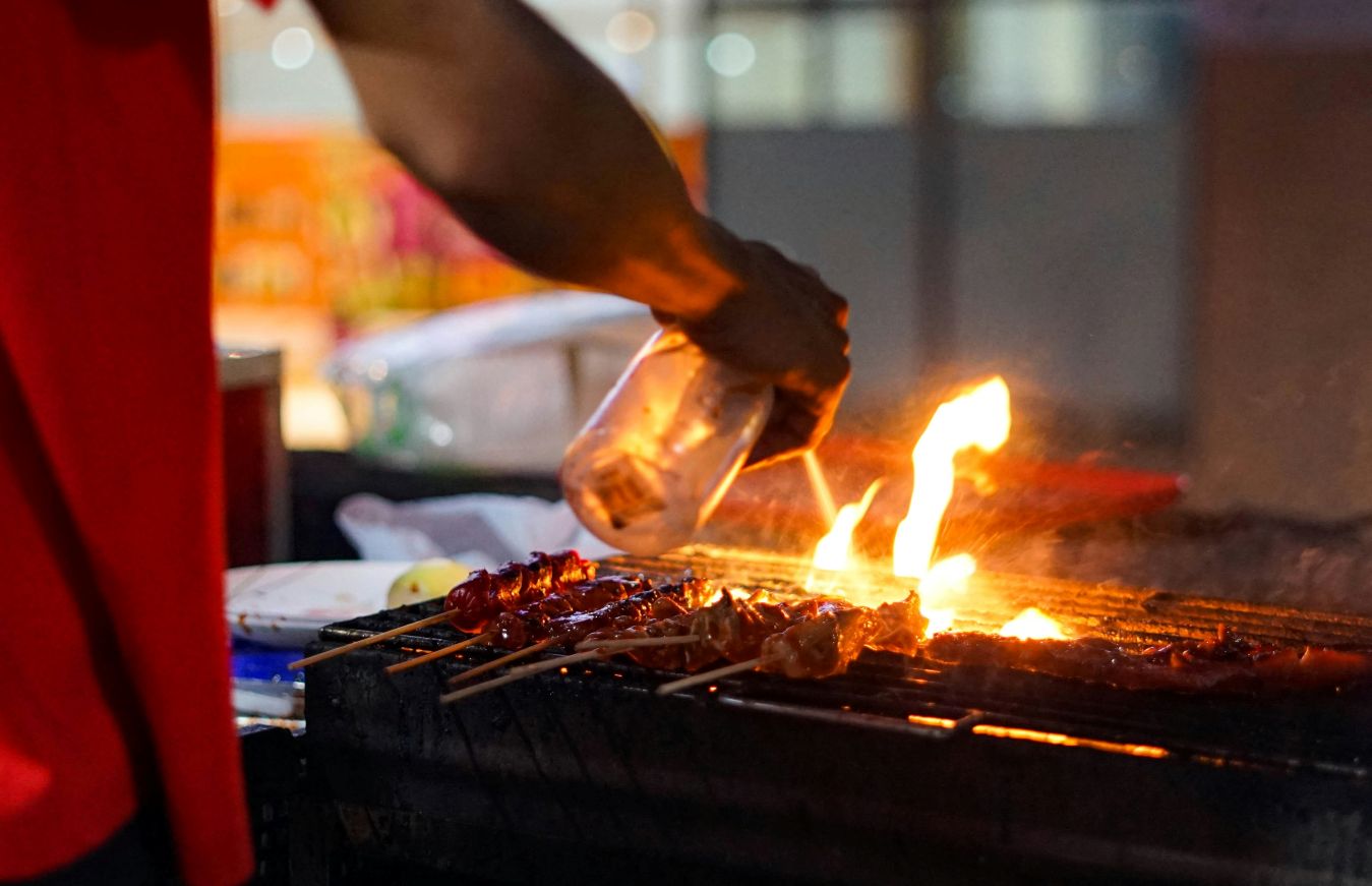 Street food scene in Manila, one of the best cities for foodies in the Philippines